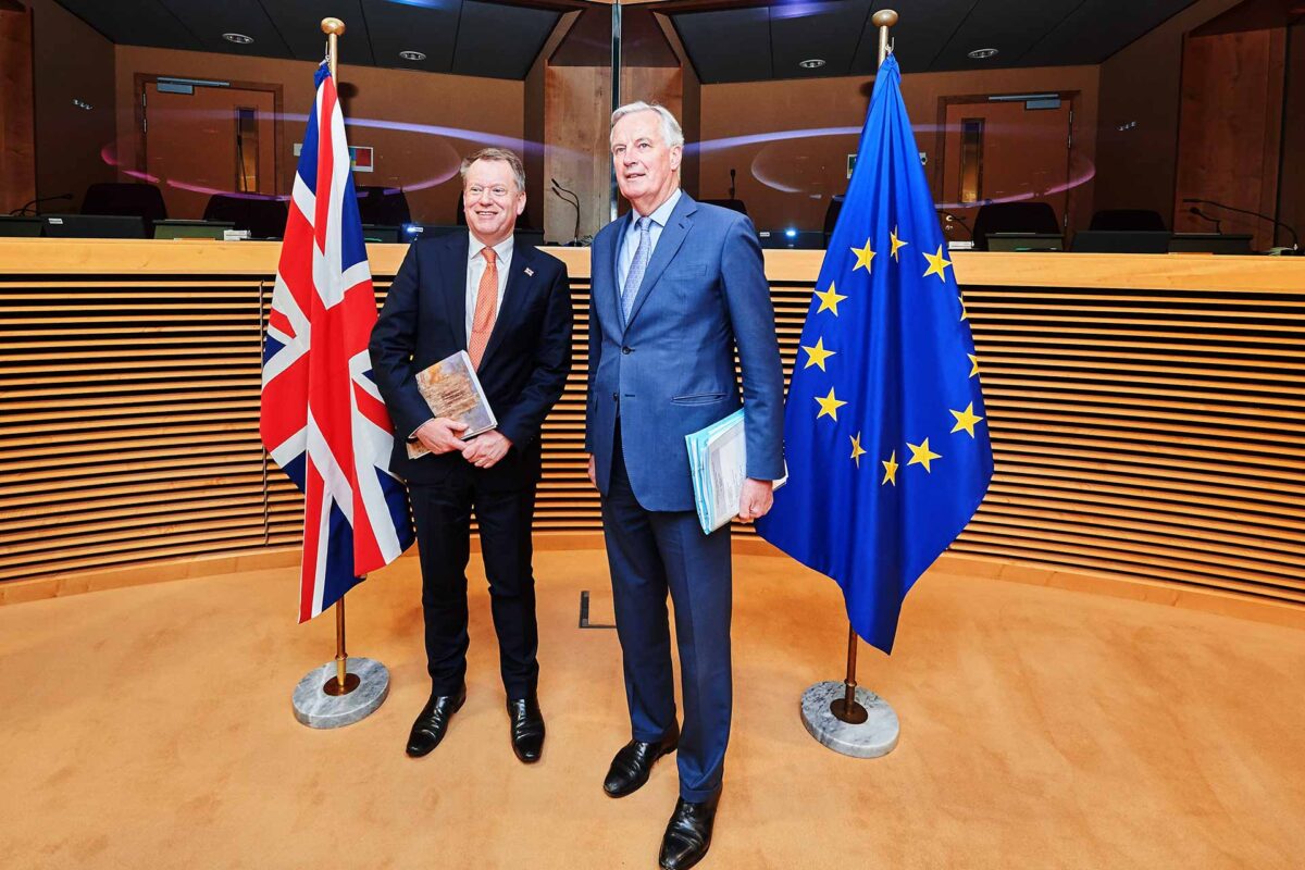 David Frost, on the left, and Michel Barnier