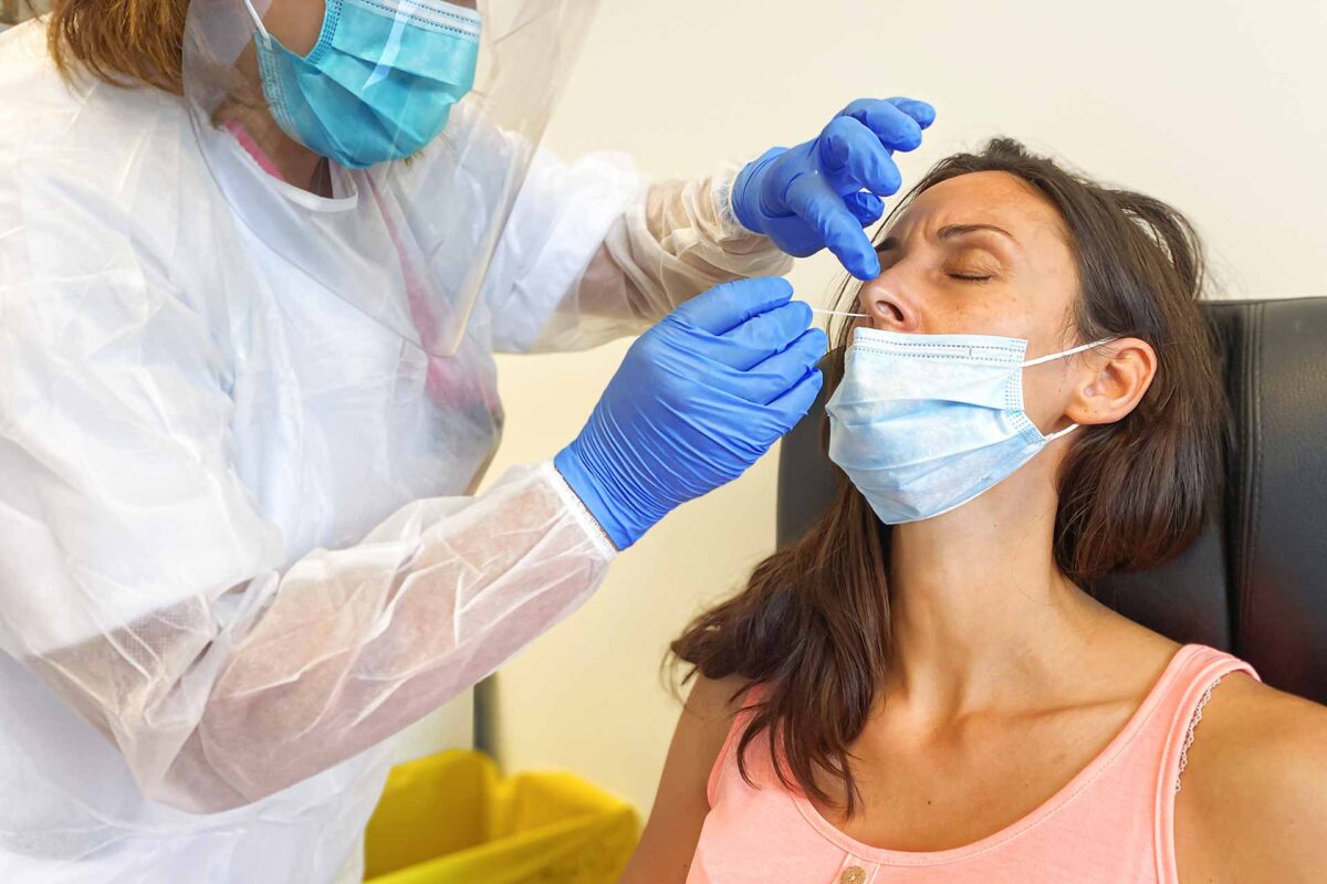 A woman being tested for coronavirus (COVID-19)