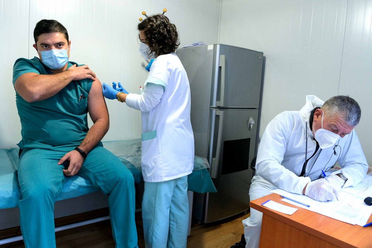 A medical worker getting vaccinated against COVID-19 in Bulgaria